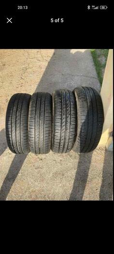 Ostalo rims and 195/65 R15 tires
