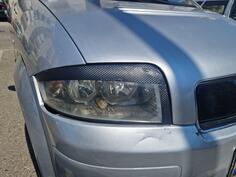 Both headlights for Audi - A2    - 2002