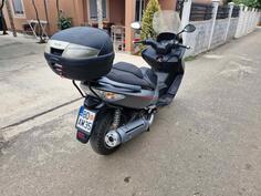 Kymco - Xciting