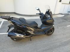 Kymco - Xciting