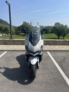 Kymco - XcitingVs