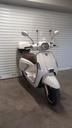 Znen - vespa veracruz 125