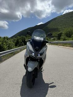 Kymco - Xtown