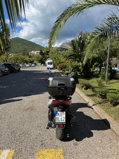 Kymco - Xtown