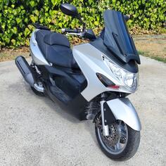 Kymco - Xciting