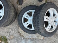MOMO rims and 18565r15 tires