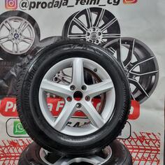 Fabričke rims and BRIDGESTONE tires