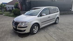 Volkswagen - Touran - 1.9 DSG