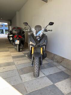 SYM - ADX 400