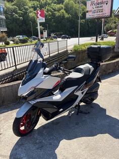 Kymco - xciting