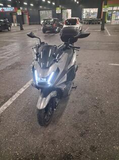 Kymco - skytown