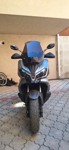 SYM - adx 300
