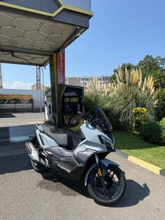 SYM - ADX 300
