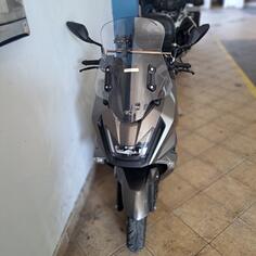 Kymco - skitovn