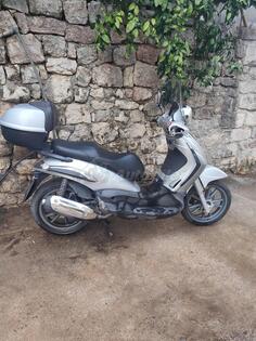 Piaggio - Tourer