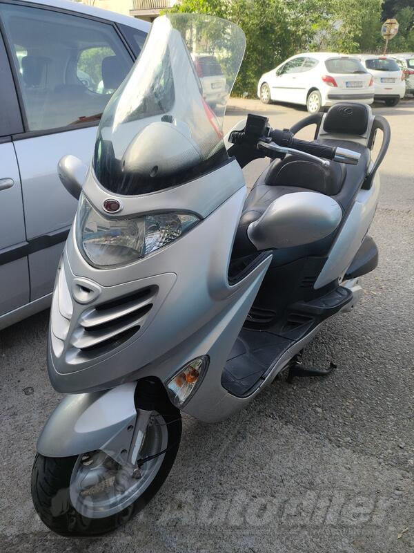 Kymco - grand dink