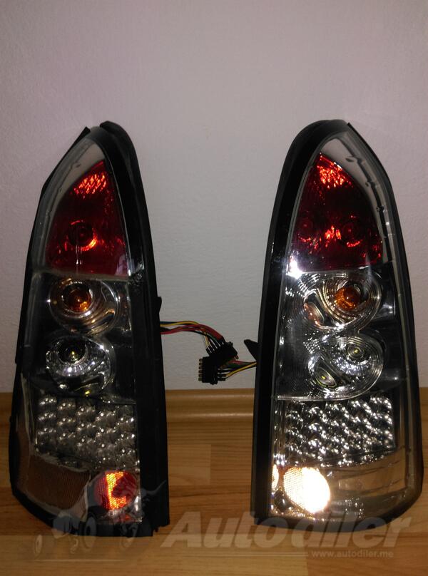 Oba stop svjetla za Opel - Astra    - 2003