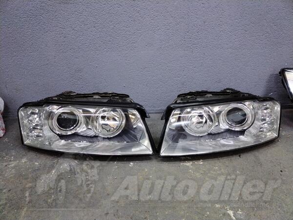 Both headlights for Audi - A8    - 2004