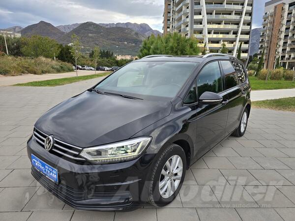 Volkswagen - Touran - 2.0 tdi highline 7 siceva