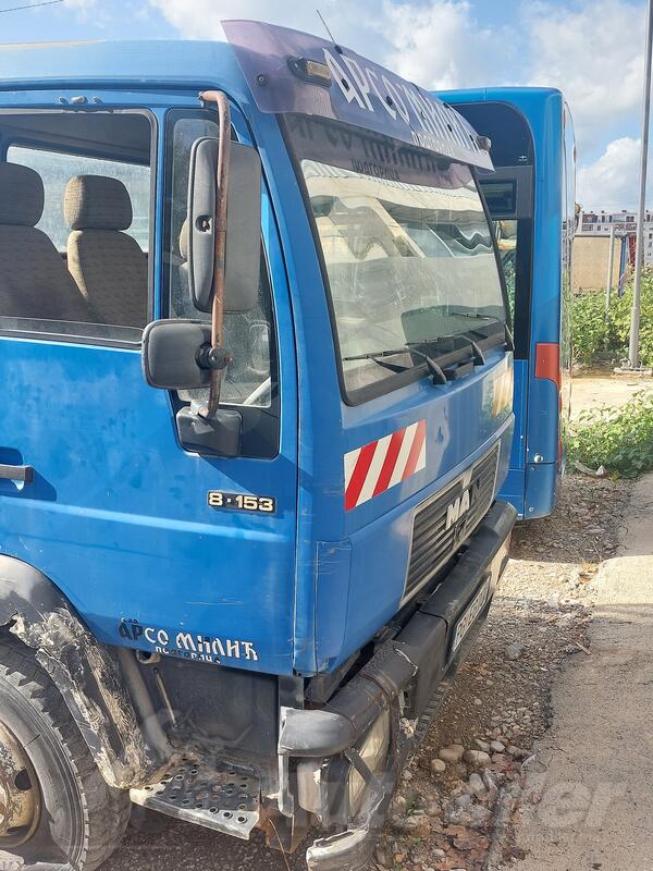 MAN - 8 153