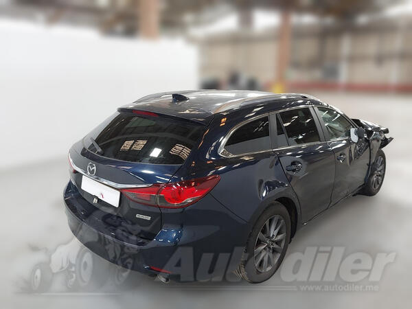 U djelovima Mazda - 6