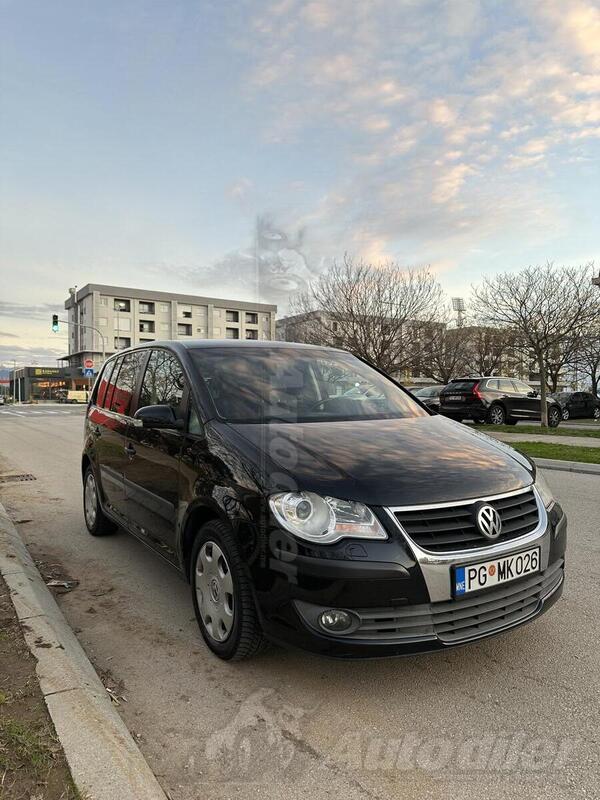 Volkswagen - Touran - 1.9 TDI 77kw DSG