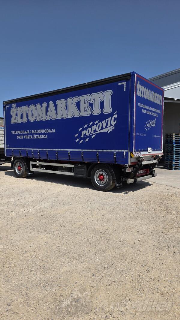 Krone - prikolica sa ceradom, rampom i stranicama