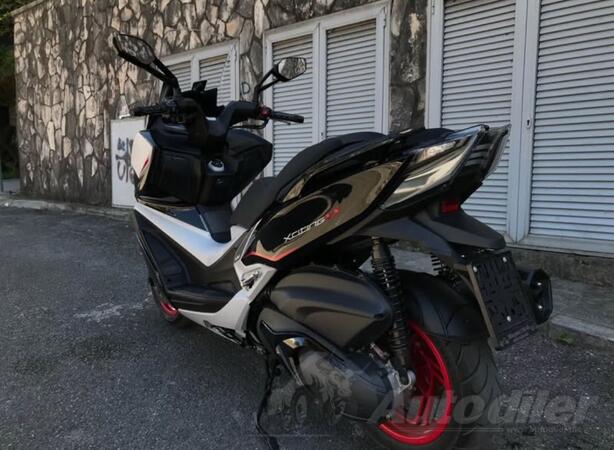 Kymco - Xciting