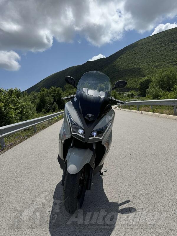 Kymco - Xtown