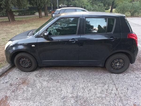 Suzuki - Swift - 1,3 benzin