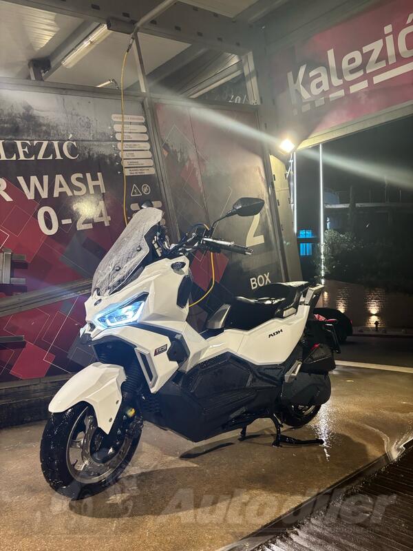 SYM - adx 125