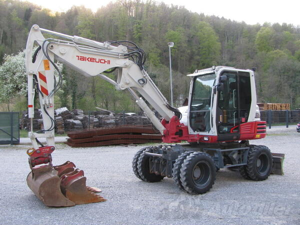 Takeuchi - Bager točkaš Takeutchi TB295W sa Powertillt 3 kašike