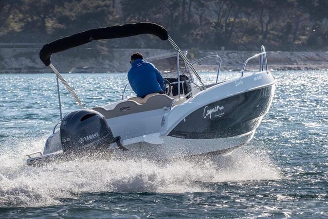 Ad boats - Cayman 585