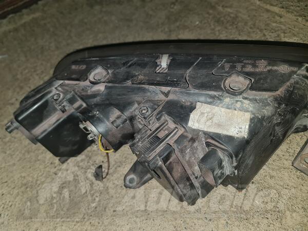 Both headlights for Volkswagen - Passat    - 2003