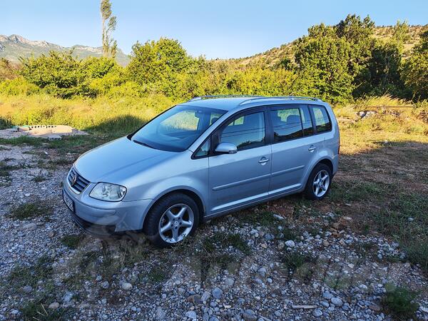 Volkswagen - Touran - 2.0tdi 103 kw