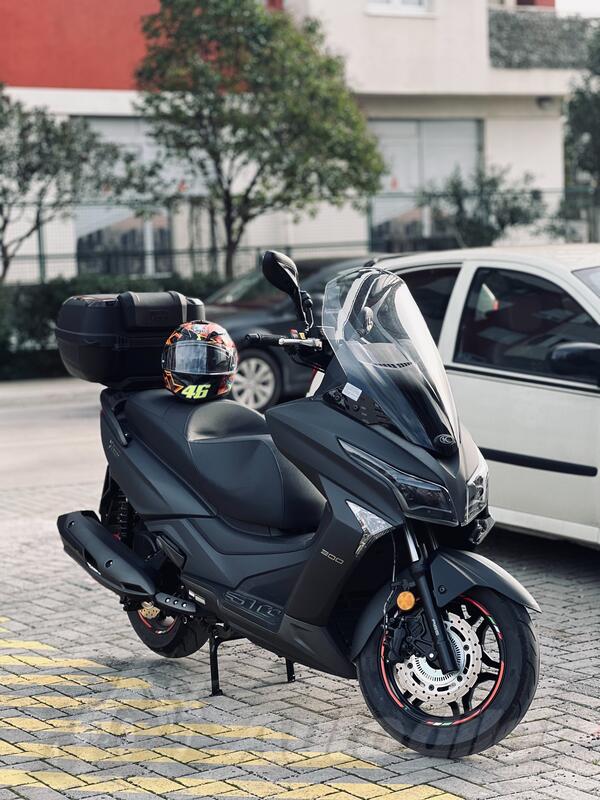 Kymco - Xtown