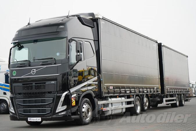 Volvo - FH 500 kamion sa klizna zavesa cerada + prikolica sa kliznom ceradom / IMP-4438