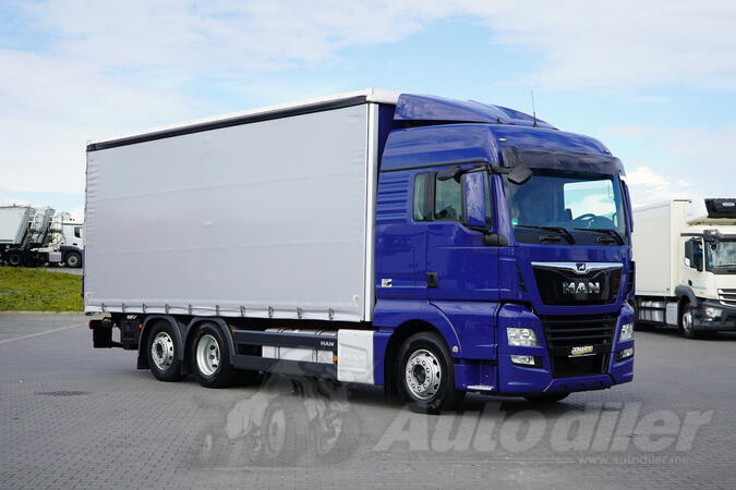 MAN - TGX / 26.460 / EURO 6 / CERADA + RAMPA / 18 PALETA / UPRAVLJIVA OSOVINA / KAMION SA CERADOM...