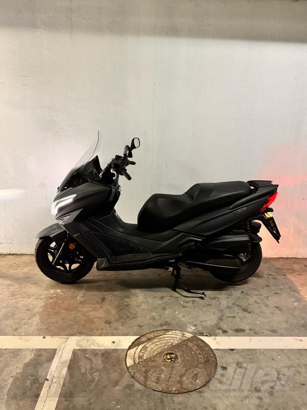 Kymco - XTown