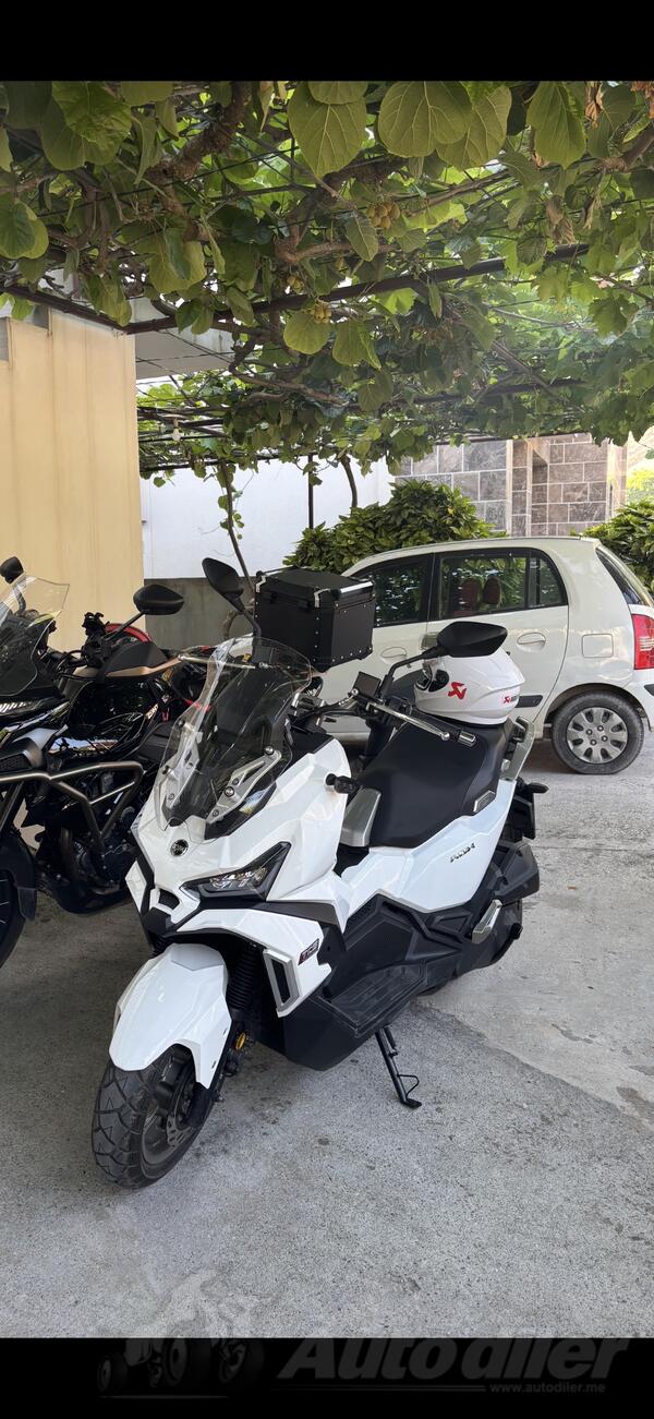 SYM - adx 125