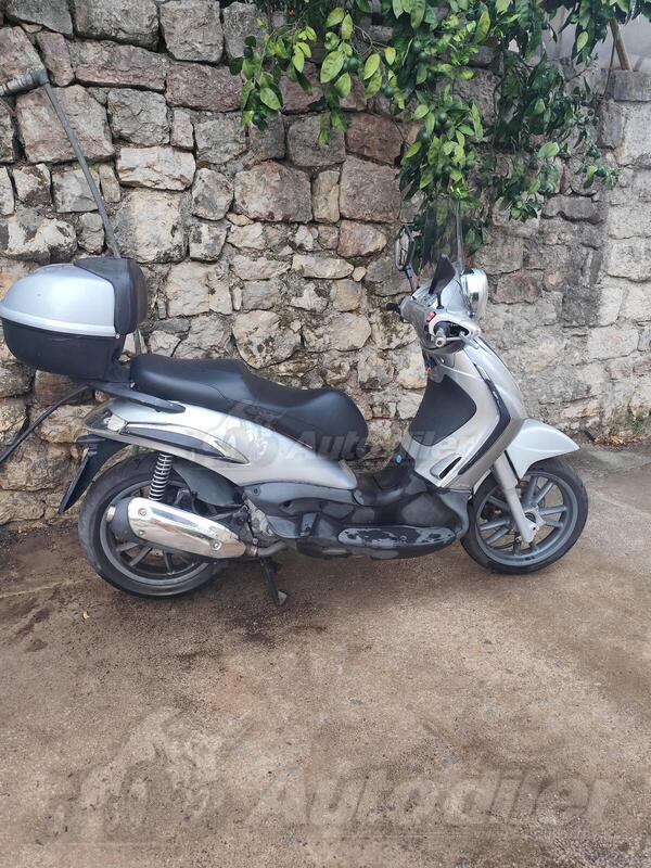 Piaggio - Tourer